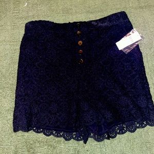 New with tags lace shorts by Maeve. Decorative front buttons and elastic waist.